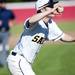 Saline third baseman Michael Barnett throws home after catching a Bedford player in a pickle on Monday, June 3. Daniel Brenner I AnnArbor.com